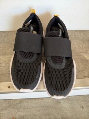 Sorel Kids Black Slip-On Sneakers with Pink Trim